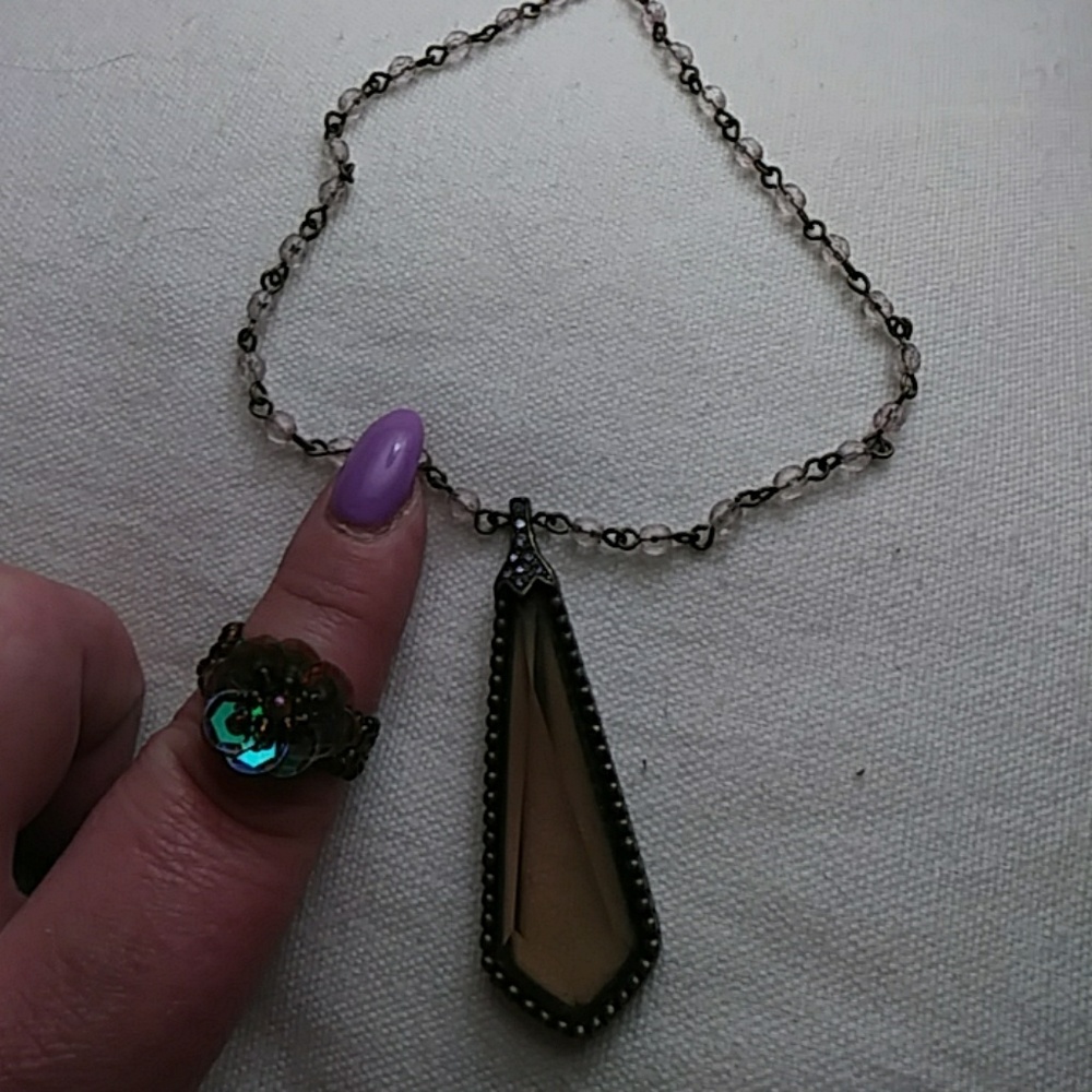 Necklace and ring.